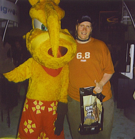 E3 2005. Posing with Ty at Krome's booth. FYI, the woman in the suit was rail thin and all of five feet tall. But very cute.