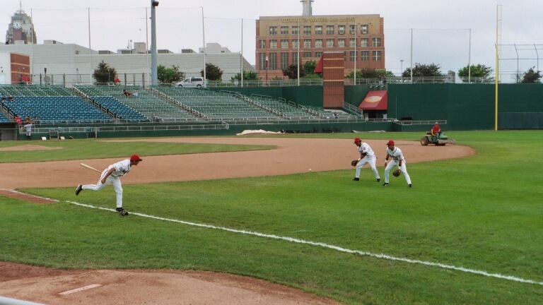 Some Lugnuts players taking ground ball practice.