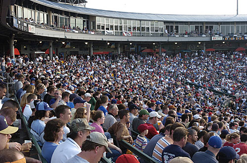 May 20. By game time, the stands were packed. Nearly 10,000 people showed up. Funny note -- we sat RIGHT behind the guy in the goatee in the bottom left of this picture. He was buying beers by the pair and became a loud, obnoxious fool by the 3rd inning. On Thursdays, beer, soda, and hot wings are only 2 dollars. (Photo by Chris Holmes, Lansing State Journal)